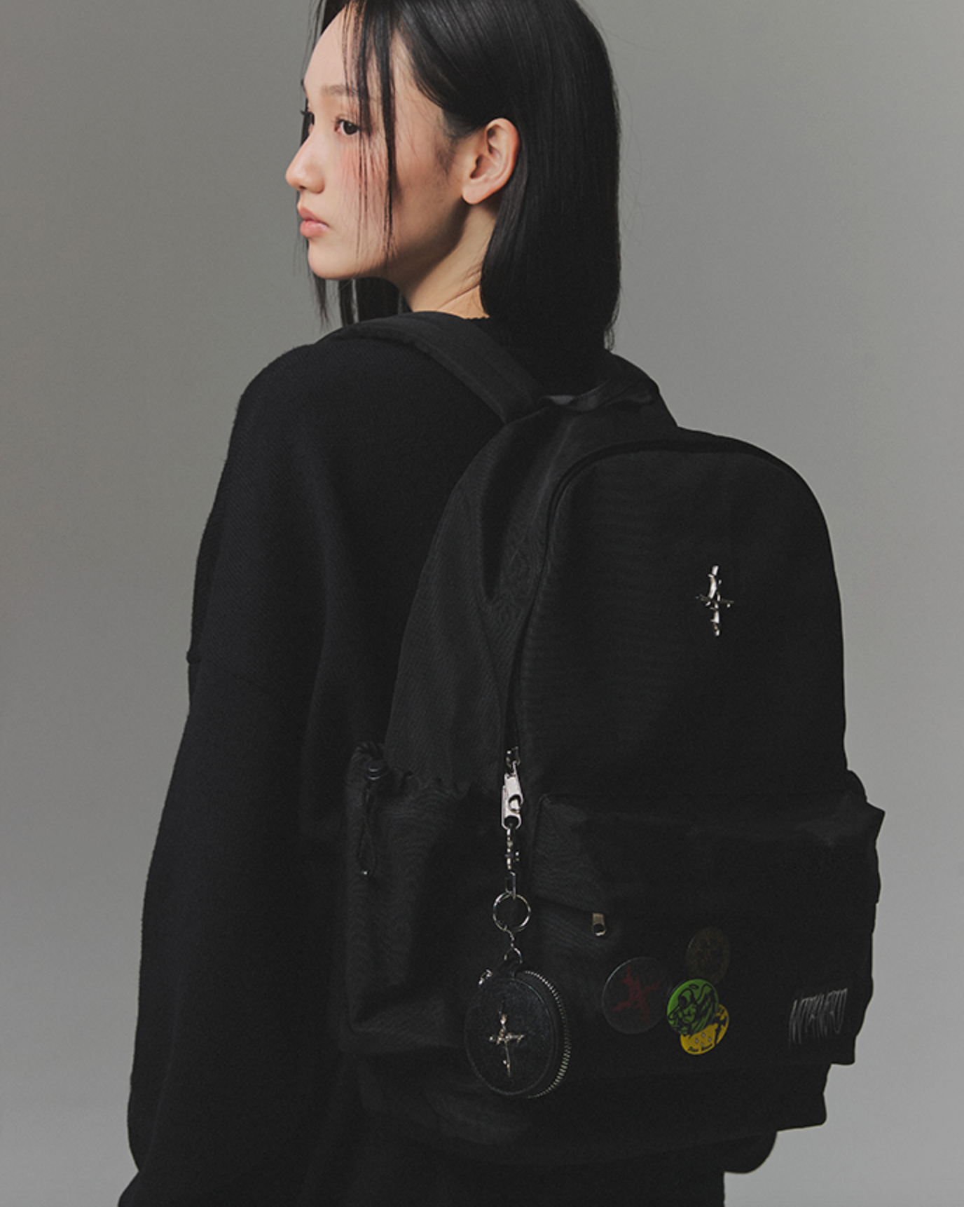 4 Symbol Pendant Patch String Pocket Backpack BLACK
